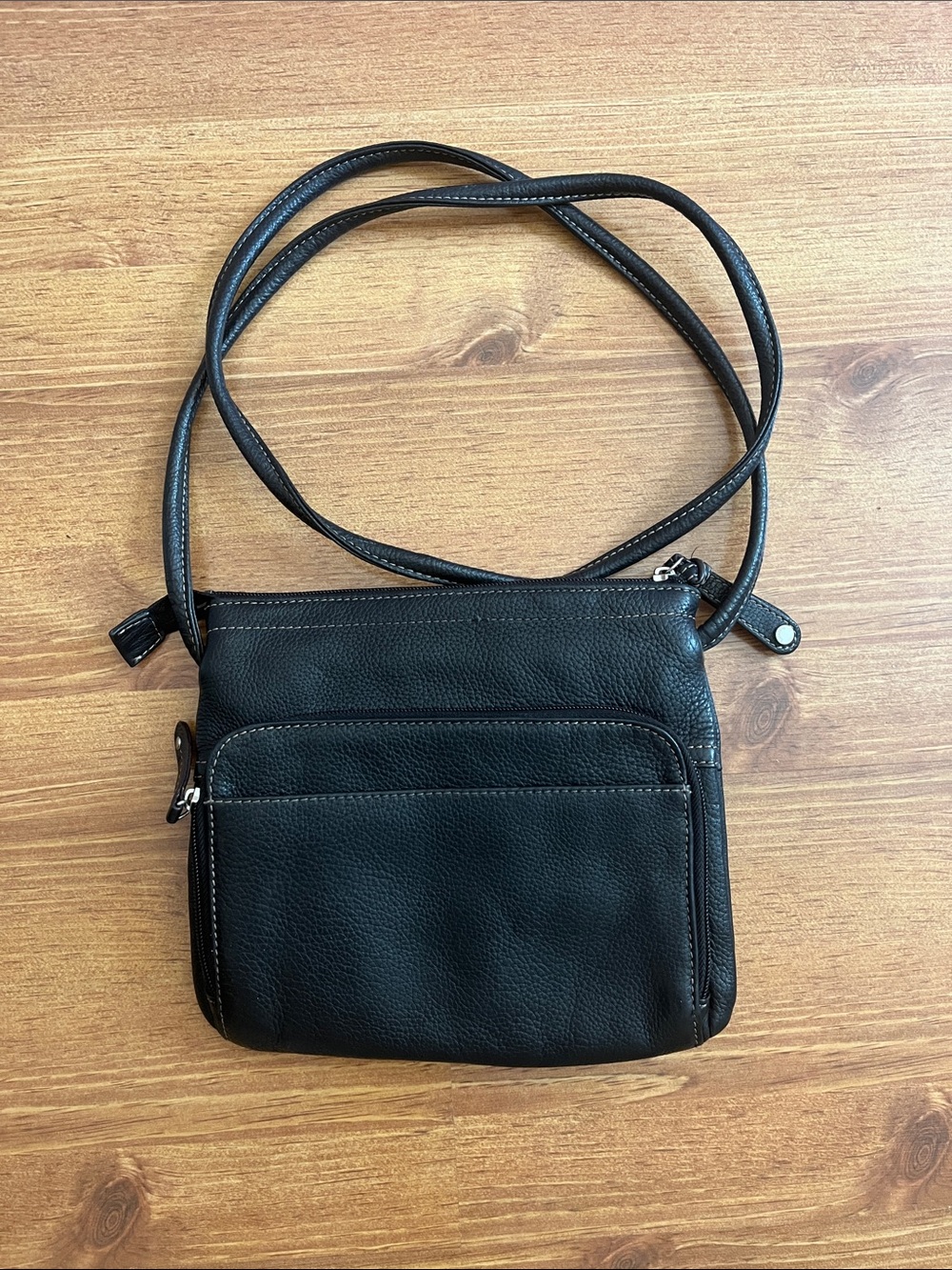 Tignanello Black Leather Crossbody Bag with Front Zip Pocket